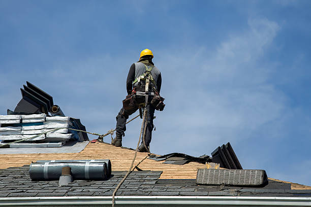 Professional Roofing technician working in Oakland, CA